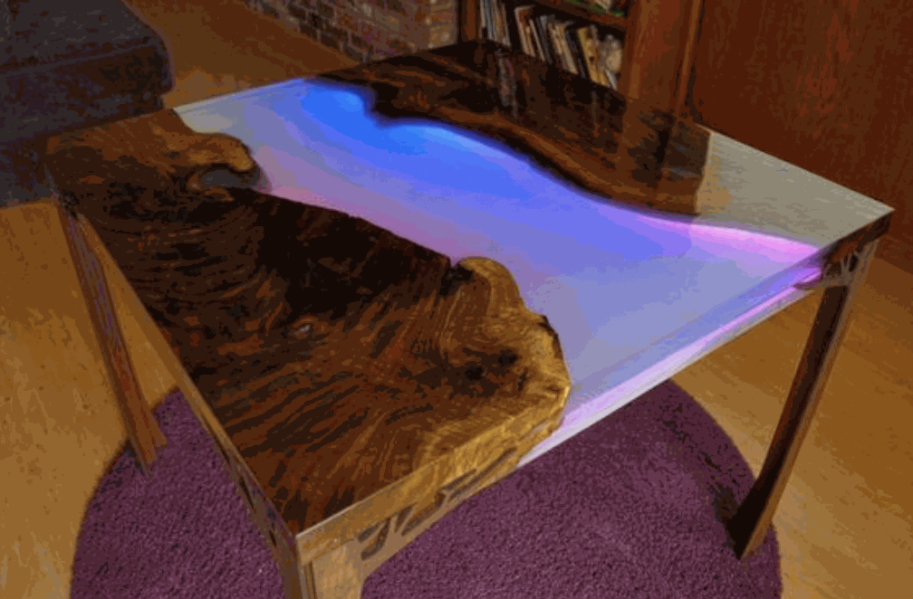Mặt bàn Epoxy kết hợp đèn neon sẽ tạo nên sự bắt mắt và nổi bật 